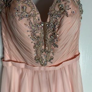 Pink floor length prom dress with beadwork